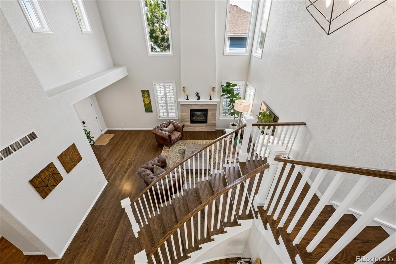 2677 Pemberly Avenue Highlands Ranch, CO 80126 - Photo 23 of 50 a view of a livingroom with furniture and staircase