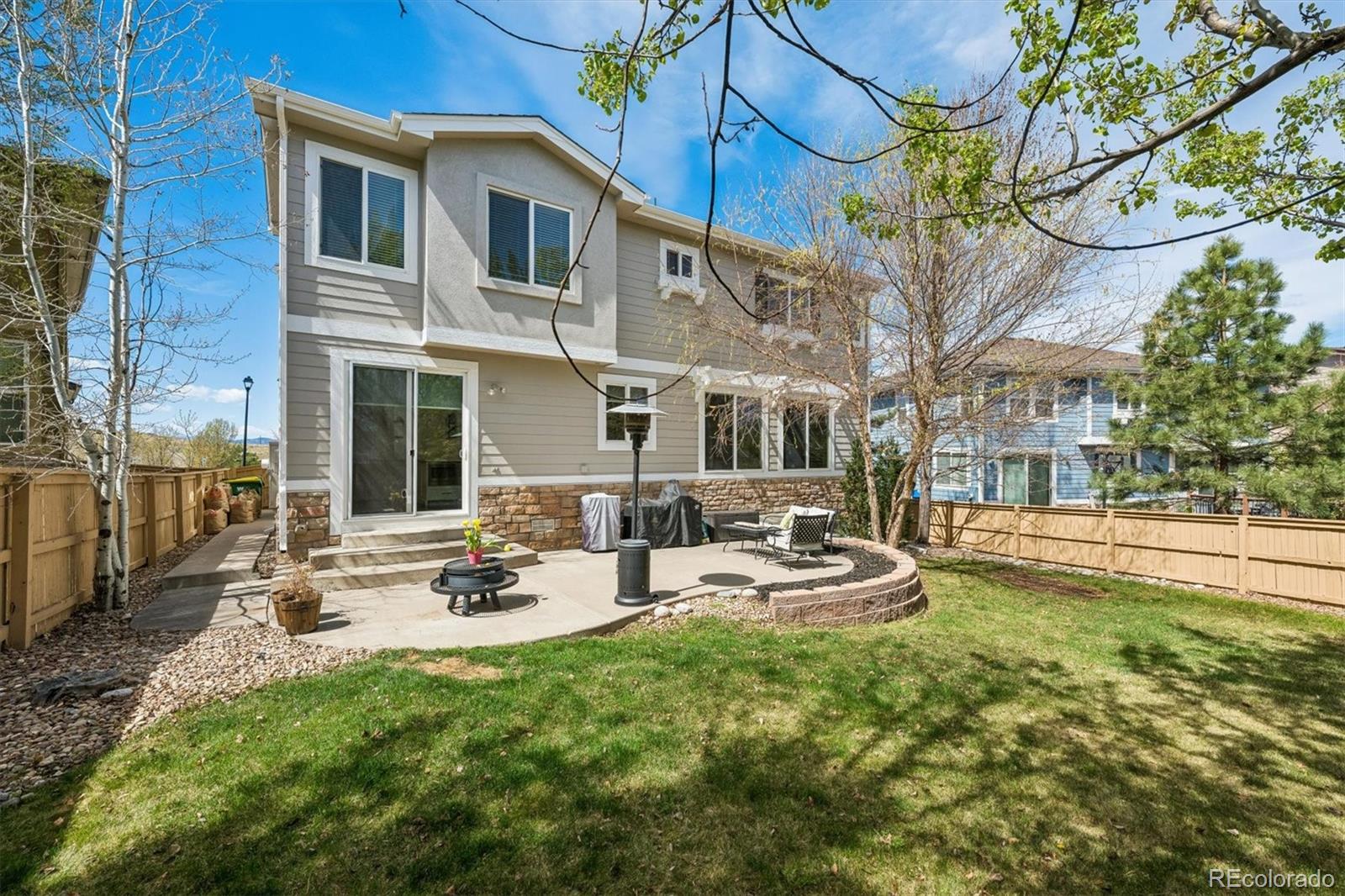 2677 Pemberly Avenue Highlands Ranch, CO 80126 - Photo 40 of 50 a view of a patio with chairs and tables