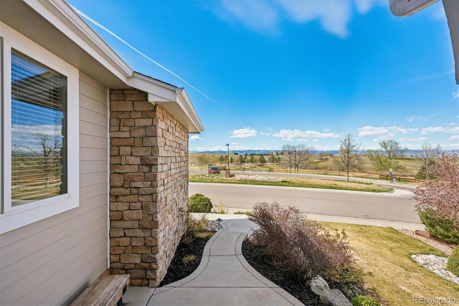 2677 Pemberly Avenue Highlands Ranch, CO 80126 - Photo 5 of 50 a view of swimming pool with outdoor space and seating area