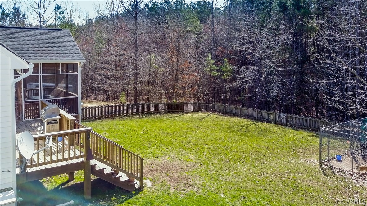 3982 County Line Road Kents Store, VA 23084 - Photo 40 of 49 a view of a backyard with swimming pool of the house