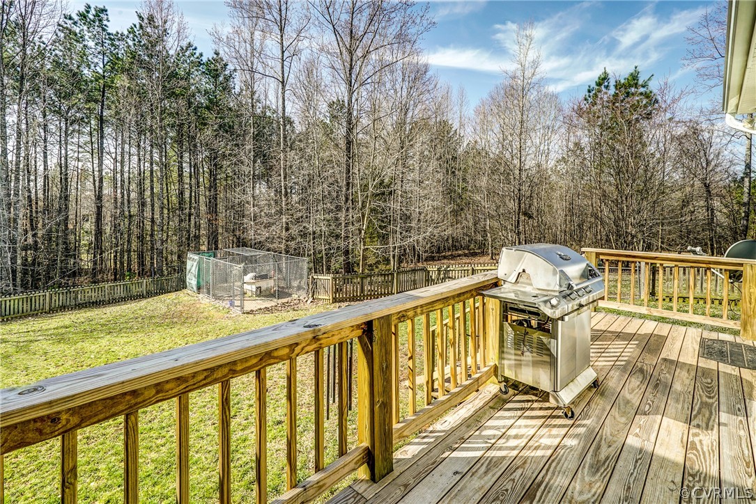 3982 County Line Road Kents Store, VA 23084 - Photo 41 of 49 a view of a balcony with wooden floor and outdoor space