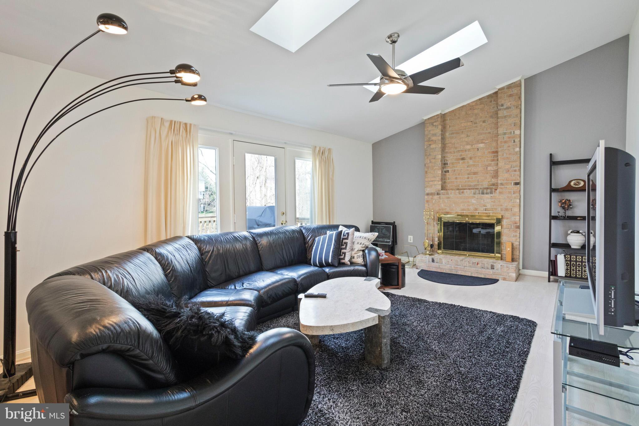 2024 Merrifields Drive Silver Spring, MD 20906 - Photo 11 of 30 Family room with wood burning fireplace