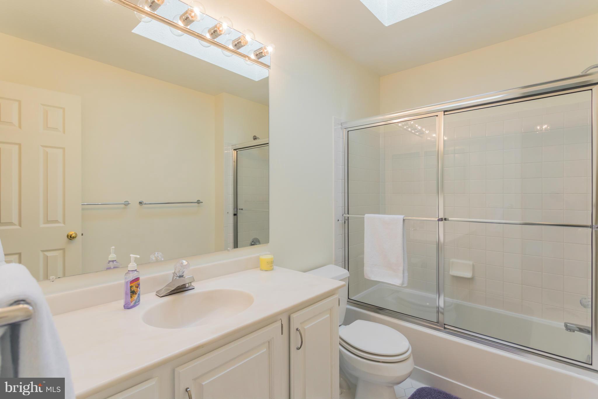 2024 Merrifields Drive Silver Spring, MD 20906 - Photo 22 of 30 Full bathroom upstairs with skylight
