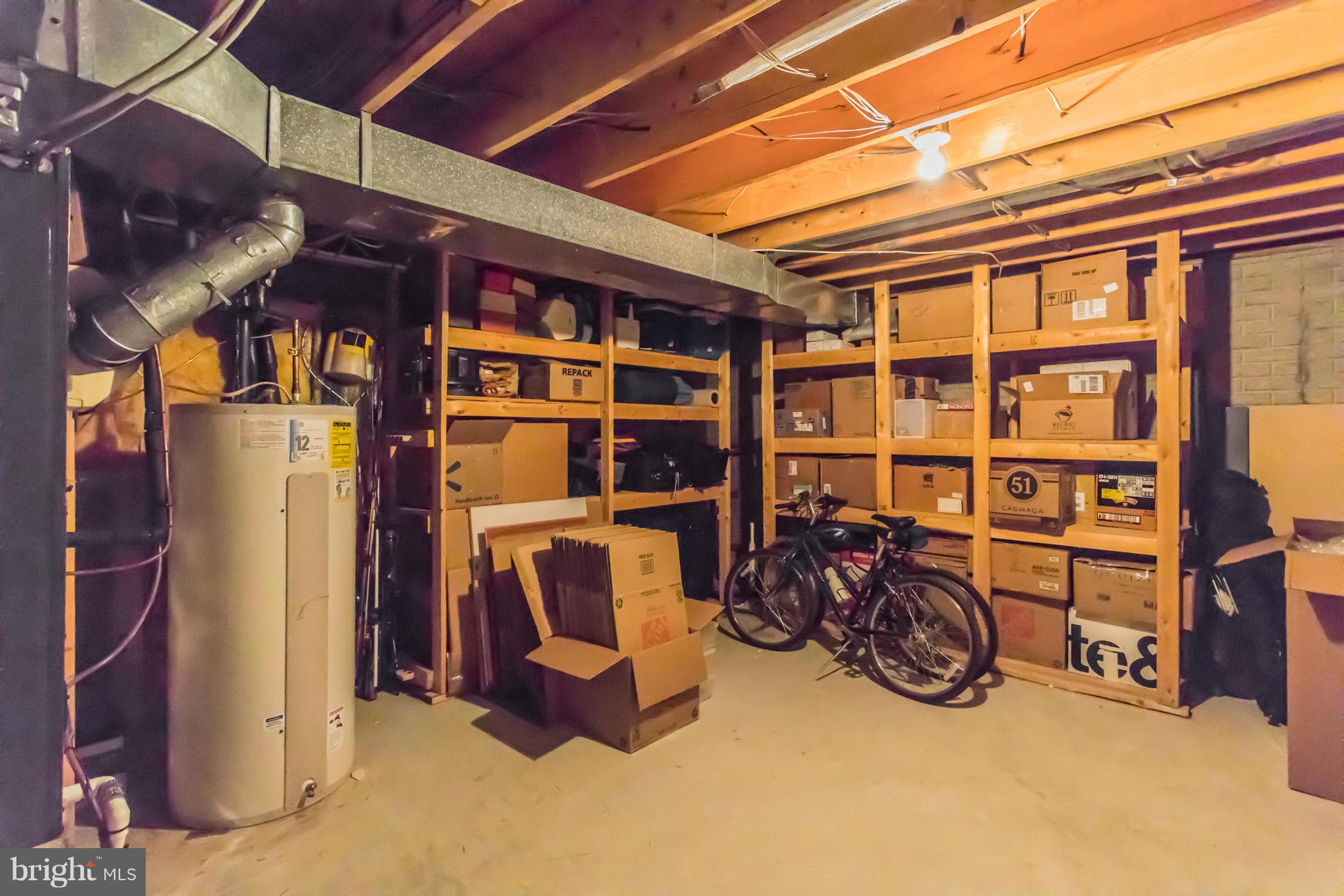 2024 Merrifields Drive Silver Spring, MD 20906 - Photo 27 of 30 Huge storage room with built-in shelving