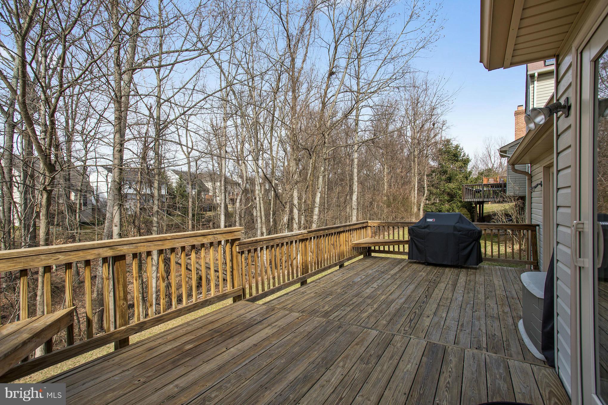 2024 Merrifields Drive Silver Spring, MD 20906 - Photo 29 of 30 Deck overlooking trees and a stream
