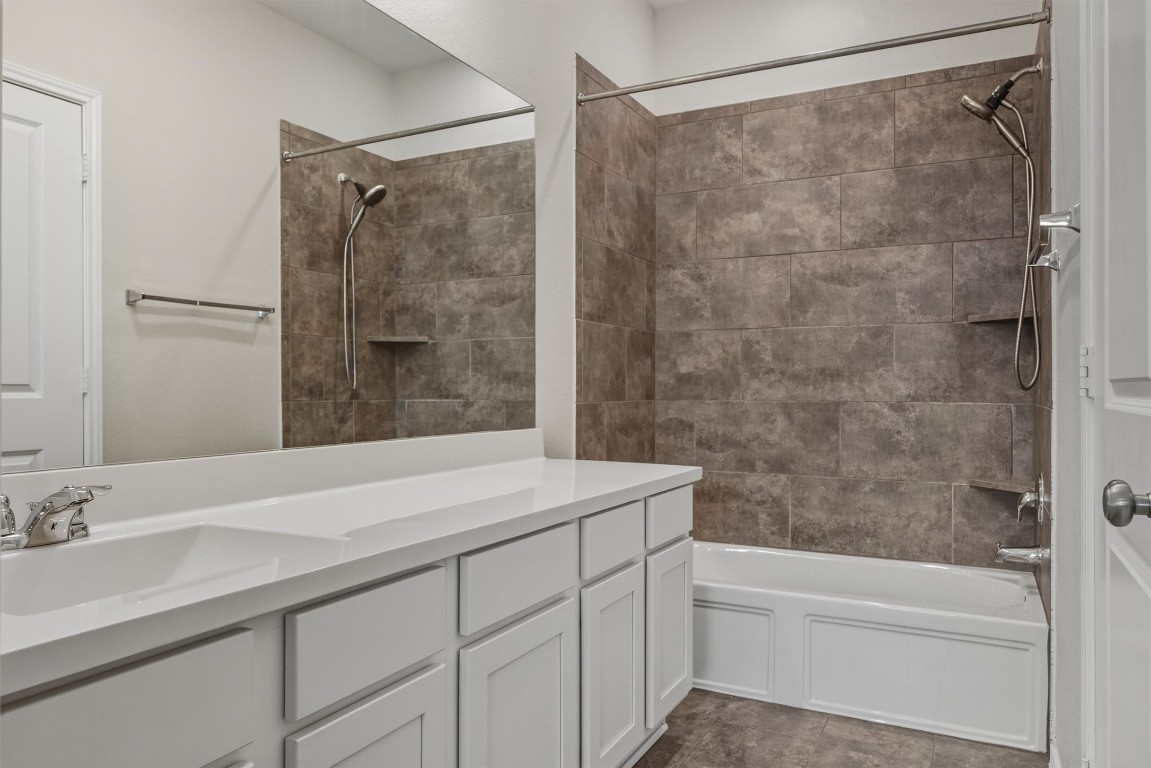 316 Montauk Loop Georgetown, TX 78628 - Photo 12 of 32 Full bathroom featuring shower / tub combination and vanity