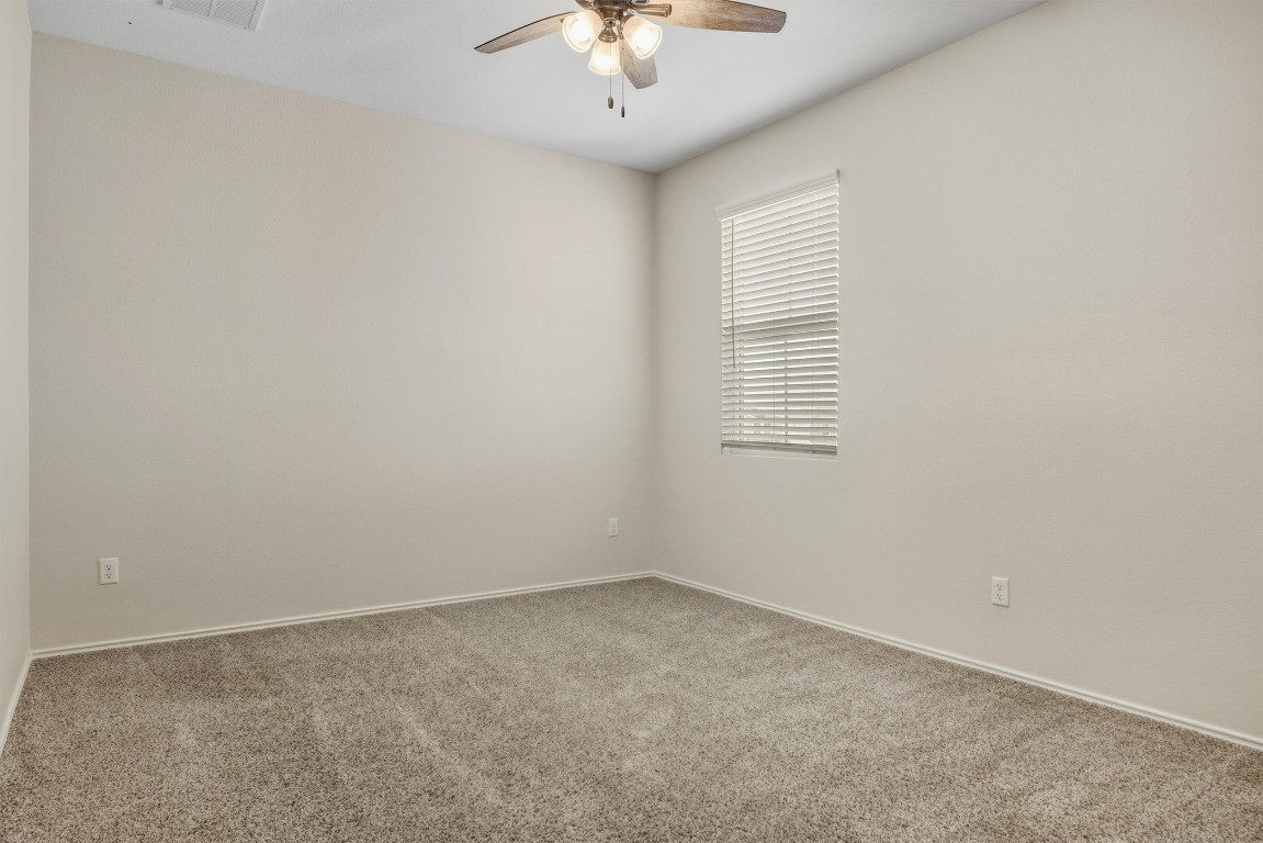 316 Montauk Loop Georgetown, TX 78628 - Photo 15 of 32 Carpeted spare room with walk-in closet