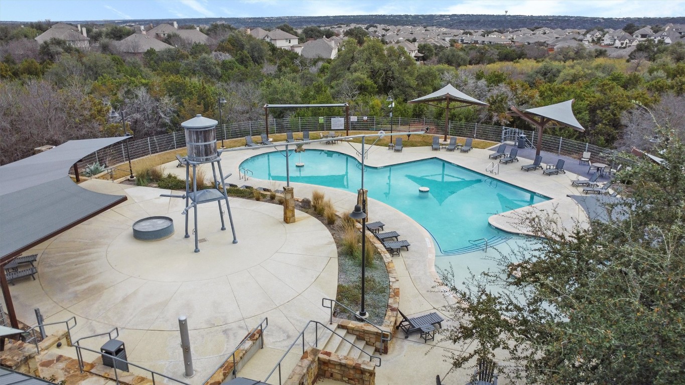 316 Montauk Loop Georgetown, TX 78628 - Photo 27 of 32 Community pool featuring a patio area