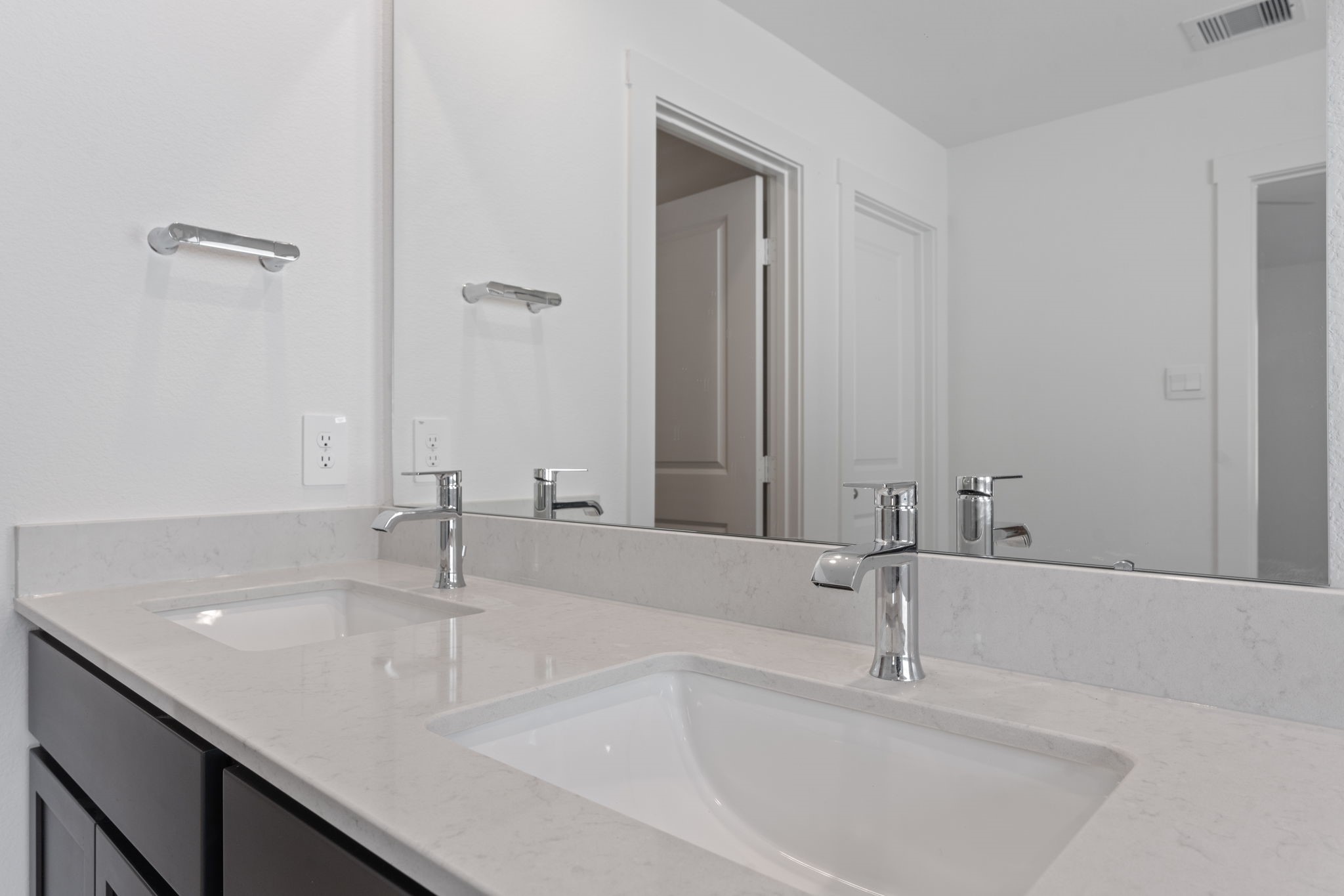 1603 Cinque Terre Way Richmond, TX 77406 - Photo 25 of 31 a bathroom with a double vanity sink and a mirror