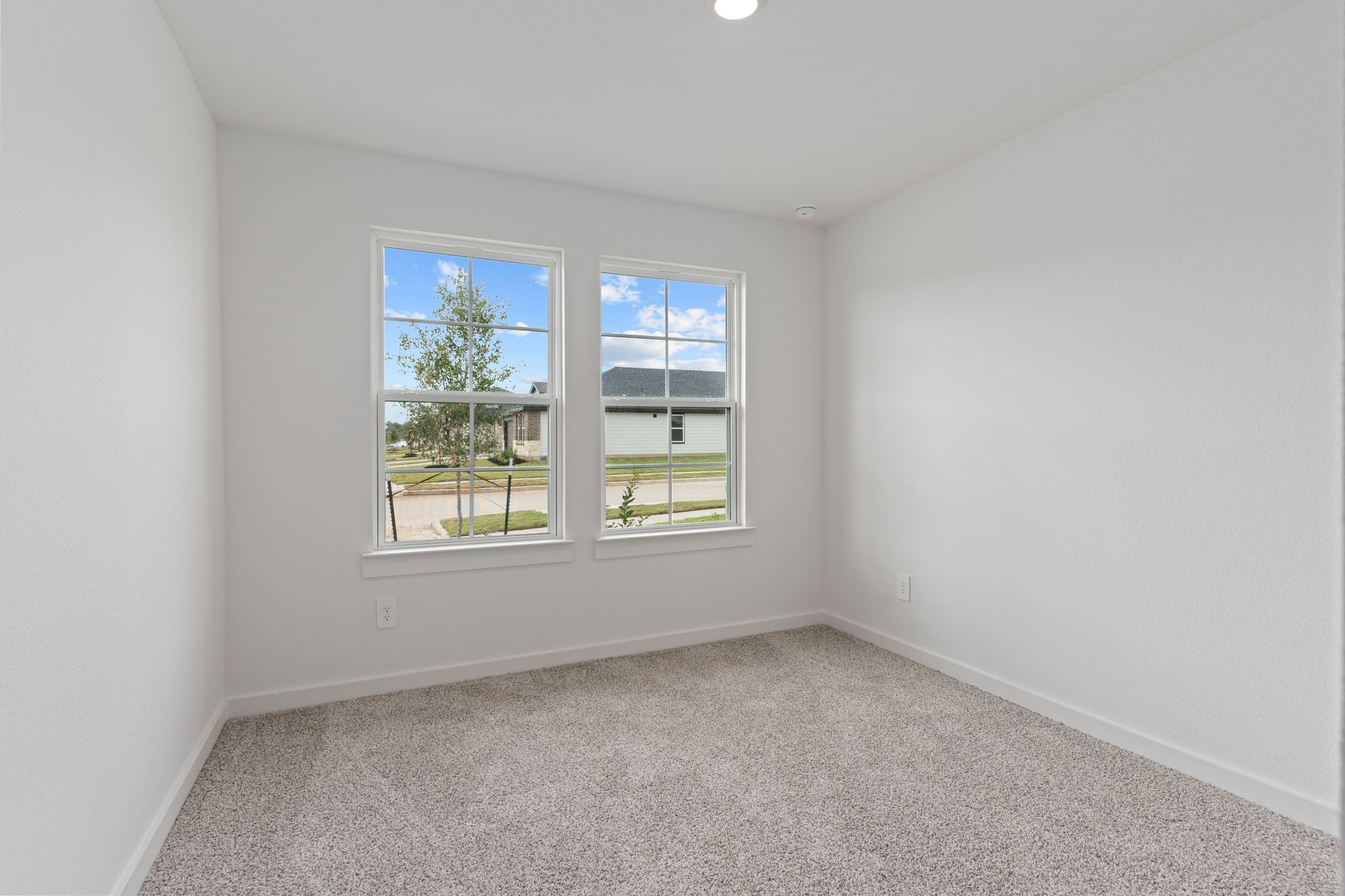 1603 Cinque Terre Way Richmond, TX 77406 - Photo 5 of 31 an empty room with a window