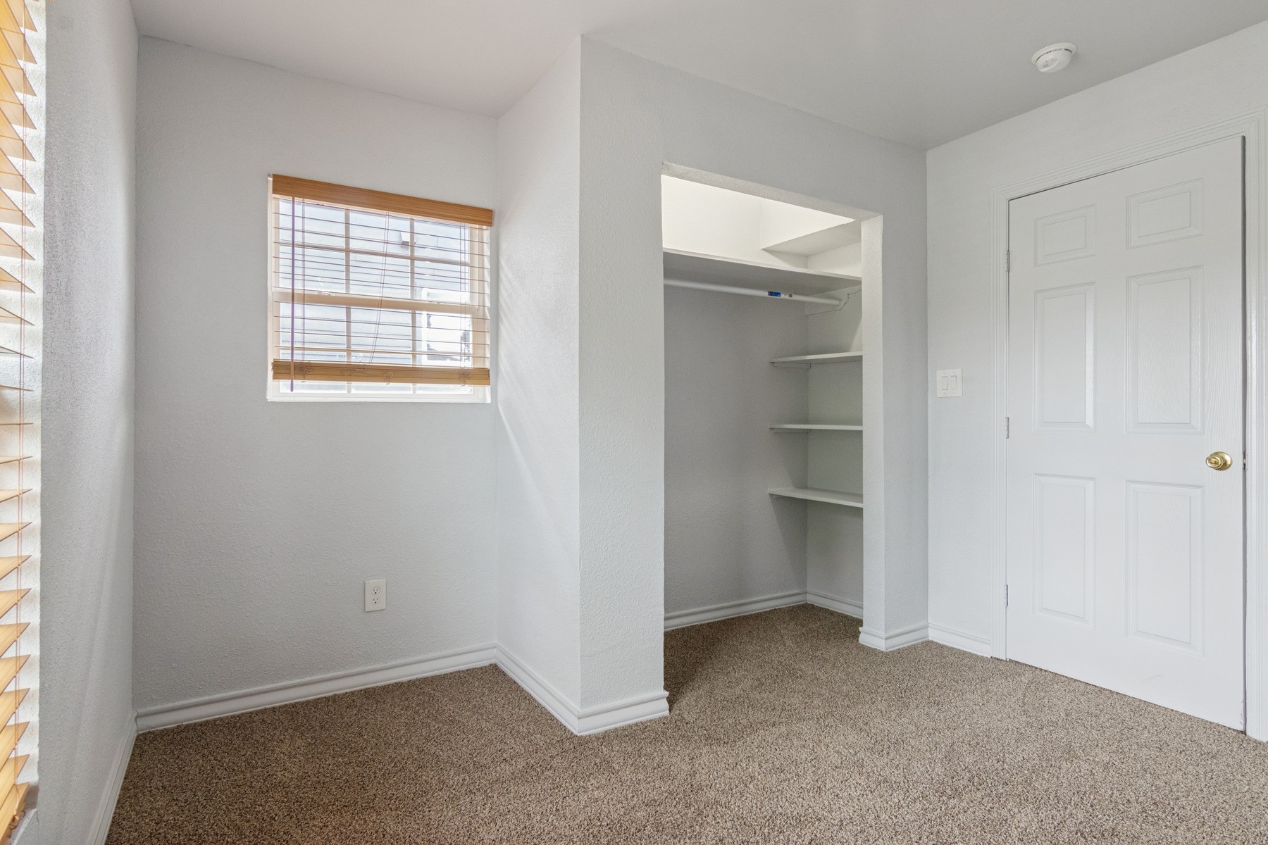 4505 Cochran Street Houston, TX 77009 - Photo 21 of 25 an empty room with a window