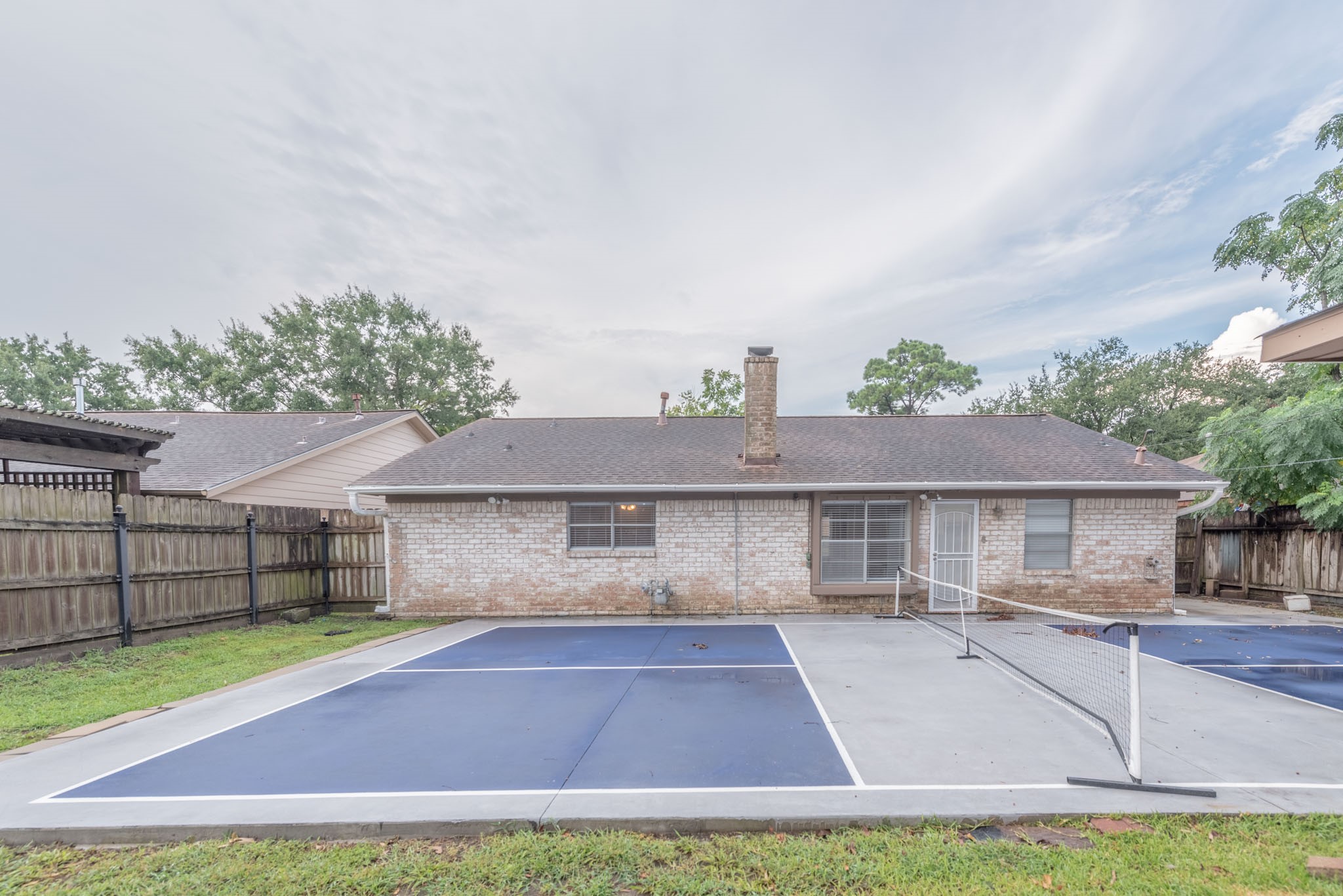 10823 Overlea Drive Houston, TX 77089 - Photo 27 of 36 a house view with a garden space
