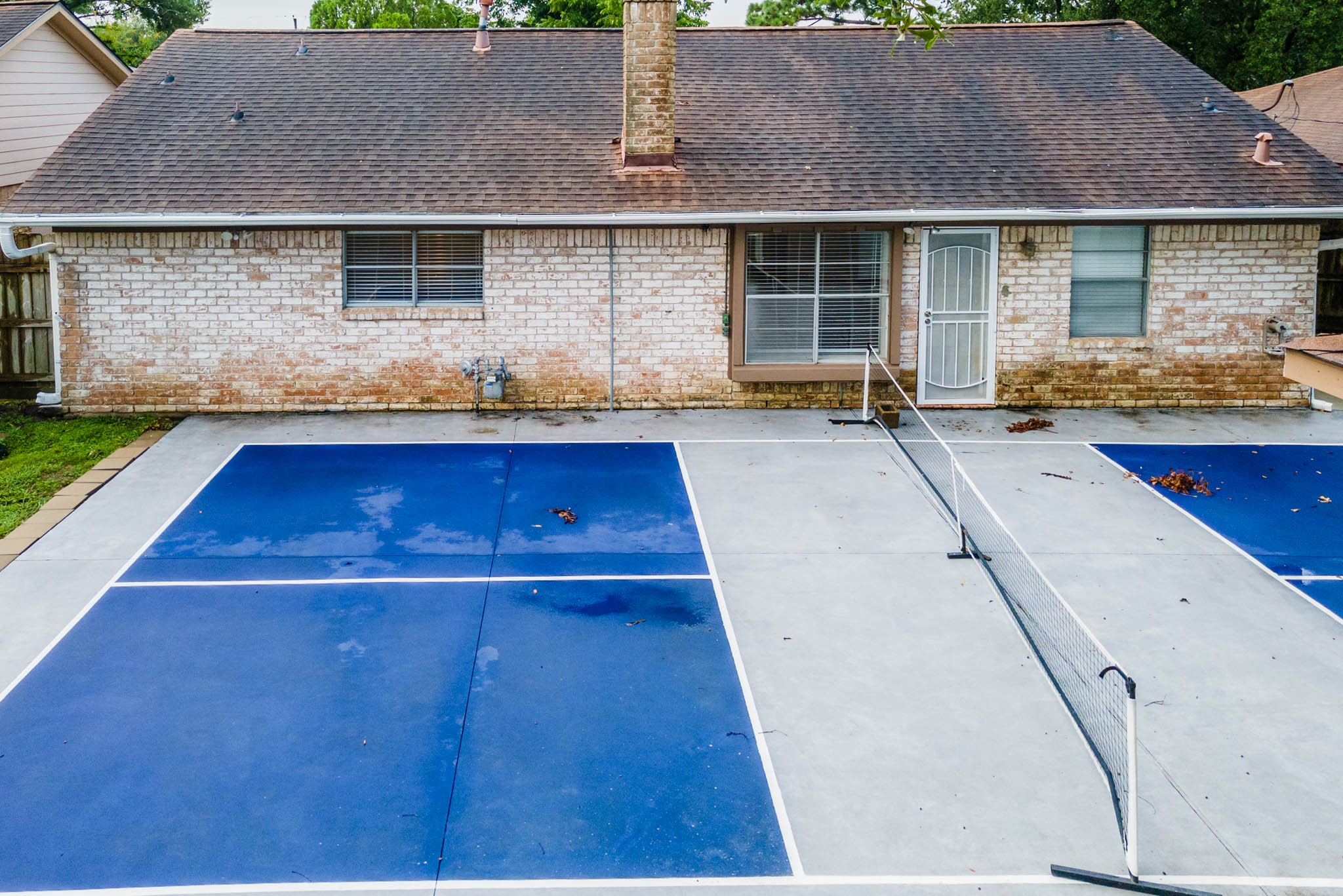 10823 Overlea Drive Houston, TX 77089 - Photo 28 of 36 an aerial view of a house with swimming pool