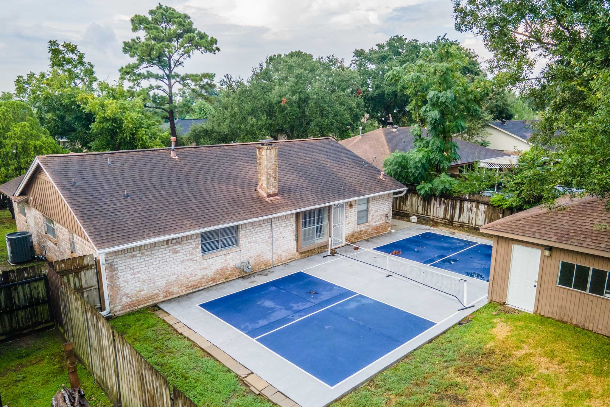 10823 Overlea Drive Houston, TX 77089 - Photo 29 of 36 an aerial view of a house with pool