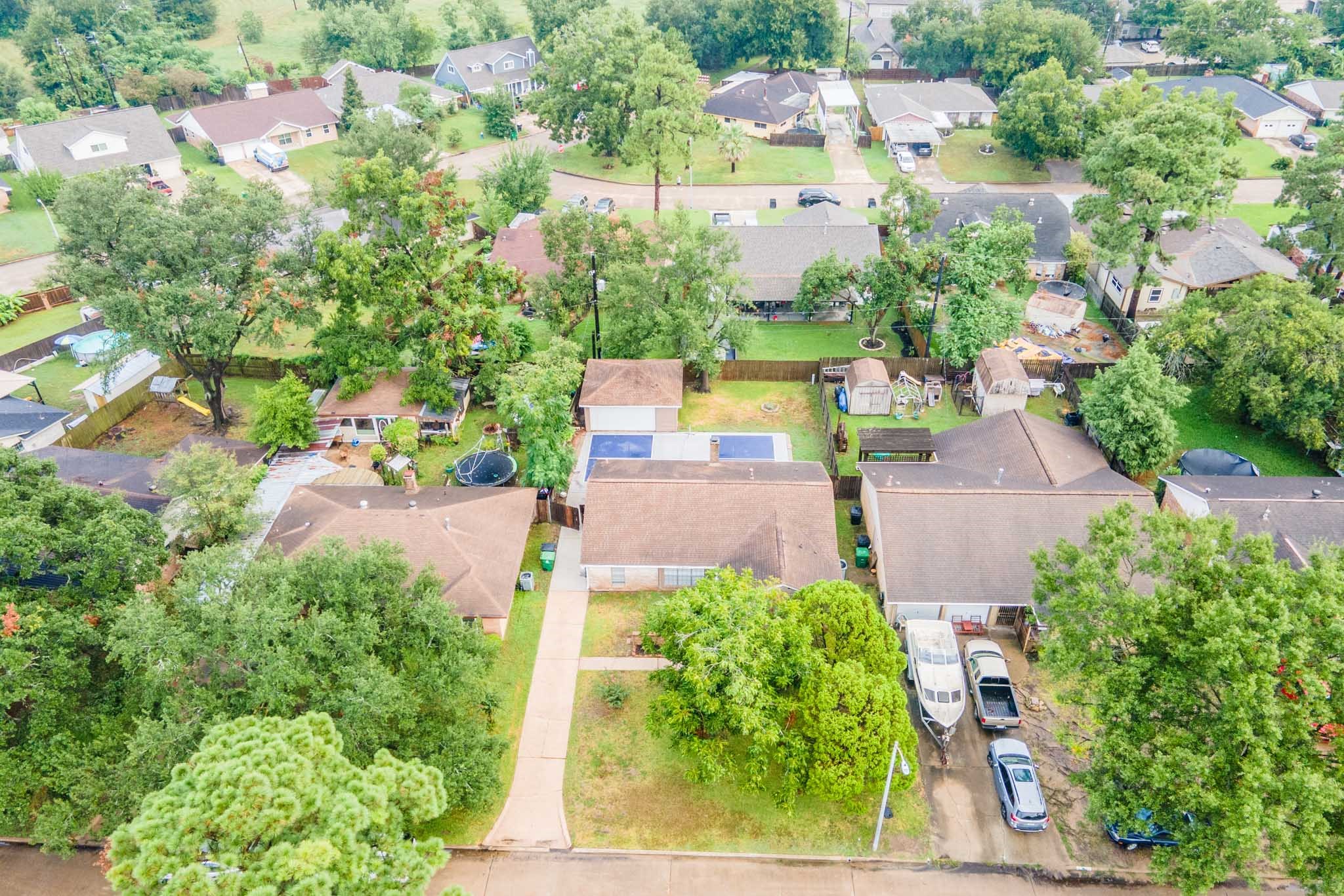 10823 Overlea Drive Houston, TX 77089 - Photo 35 of 36 an aerial view of a house with a yard and garden