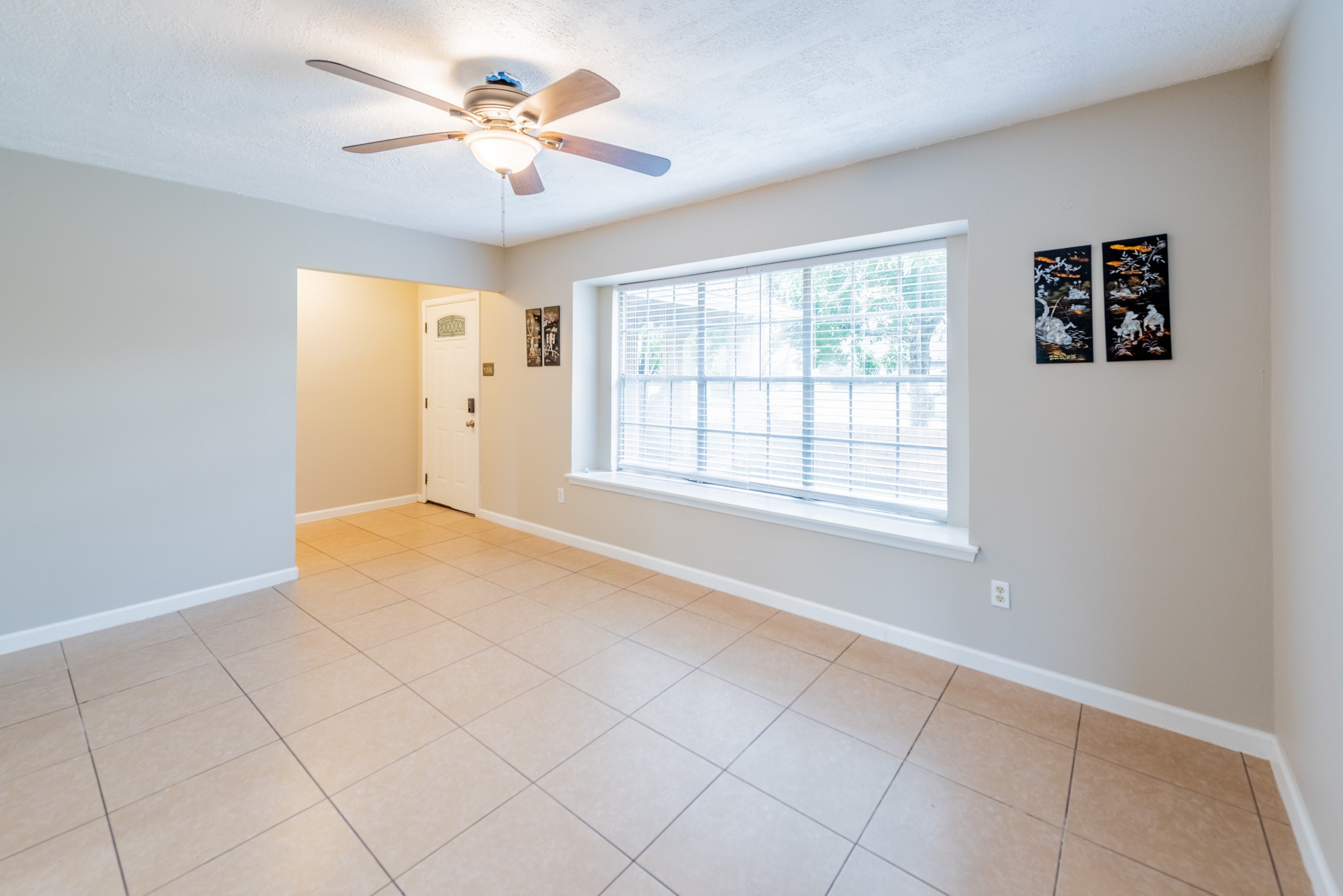 10823 Overlea Drive Houston, TX 77089 - Photo 6 of 36 a view of an empty room with a window