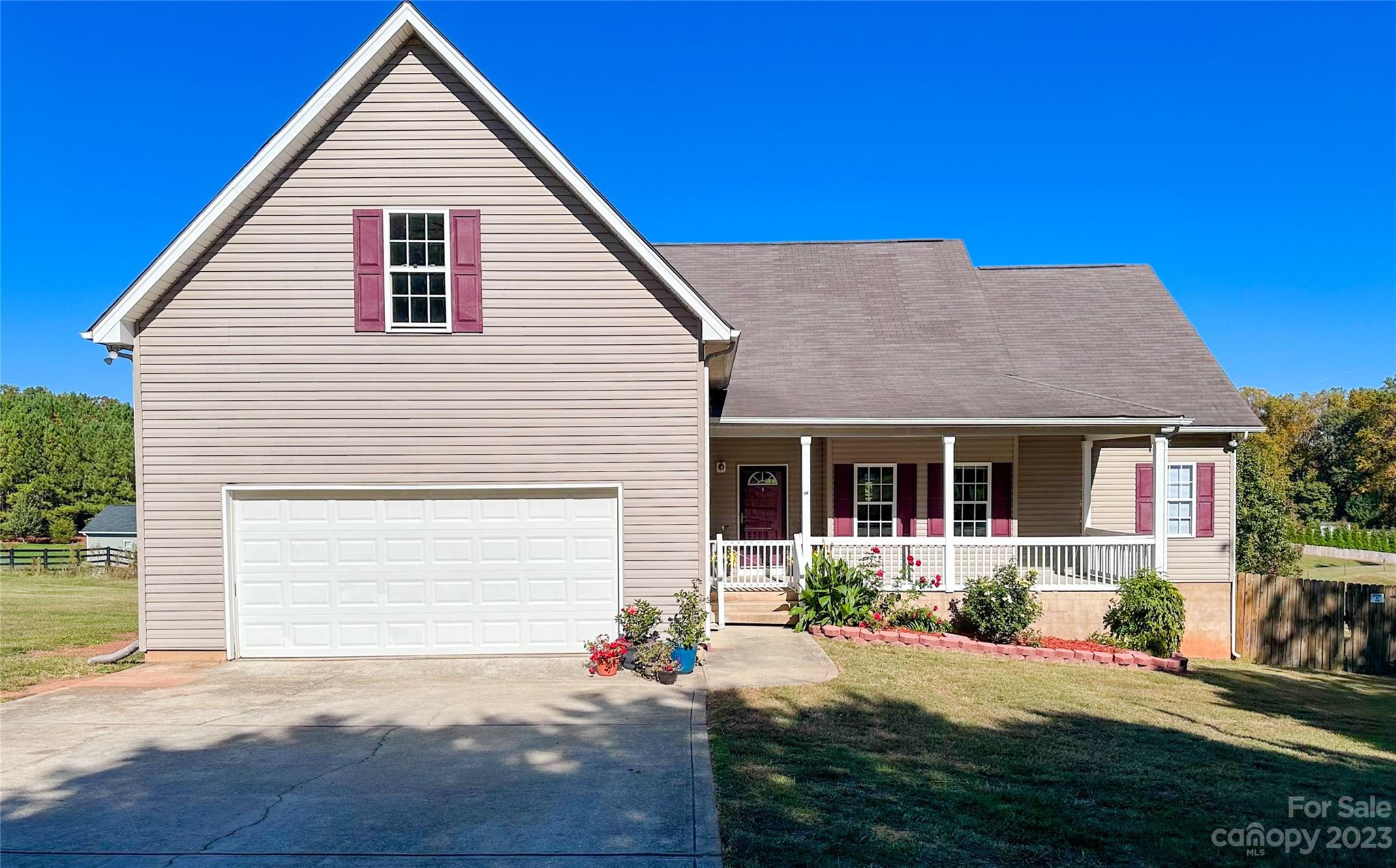 a front view of a house with yard