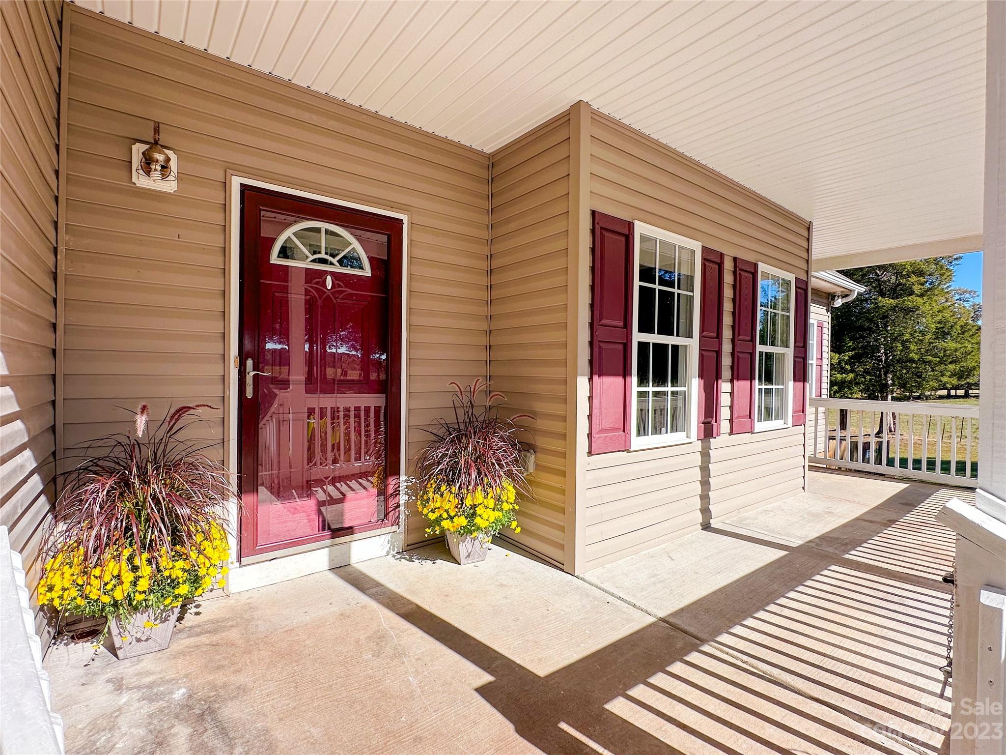 181 Weathers Creek Road Troutman, NC 28166 - Photo 2 of 25 a view of a entryway door front of house