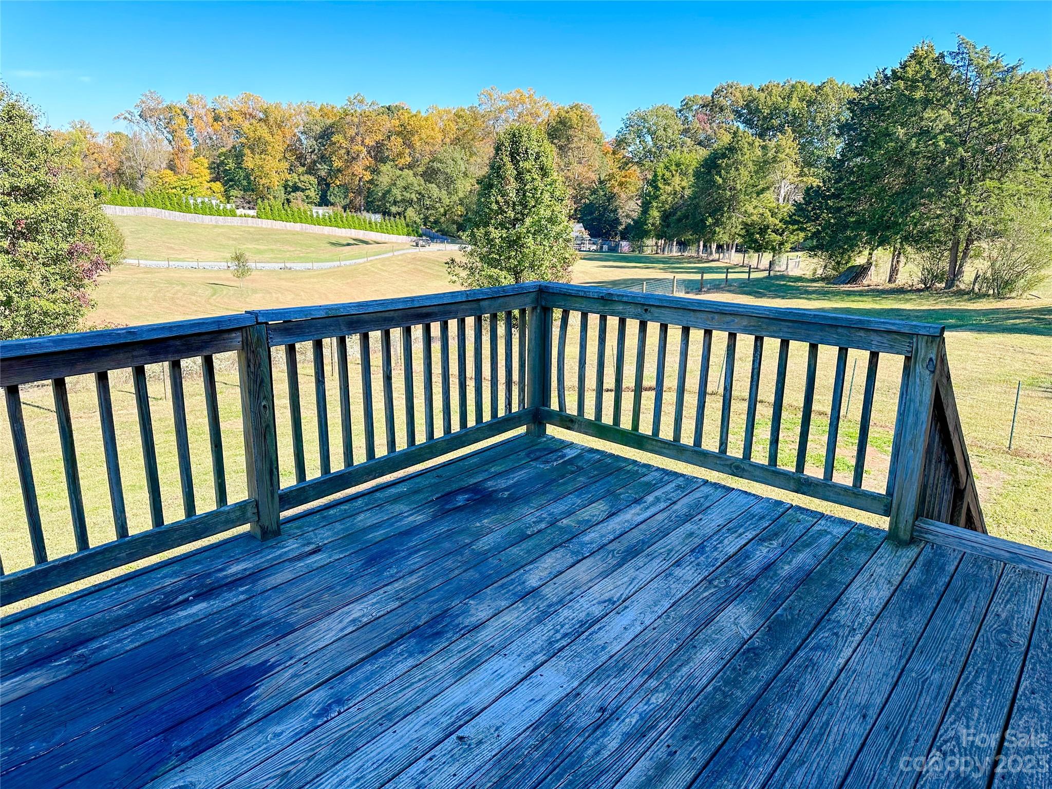 181 Weathers Creek Road Troutman, NC 28166 - Photo 23 of 25 a view of balcony with wooden floor