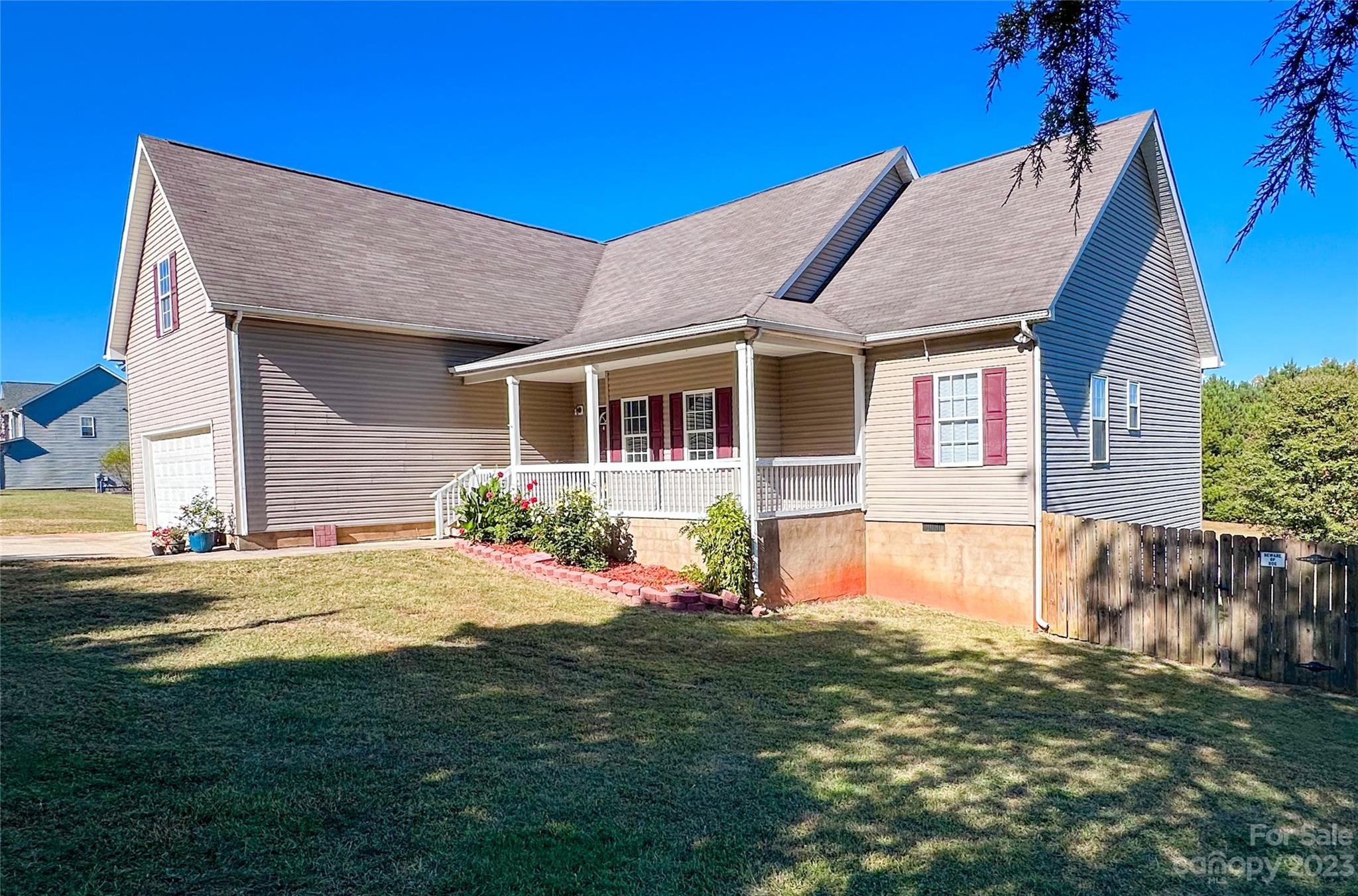 181 Weathers Creek Road Troutman, NC 28166 - Photo 3 of 25 a front view of a house with a yard