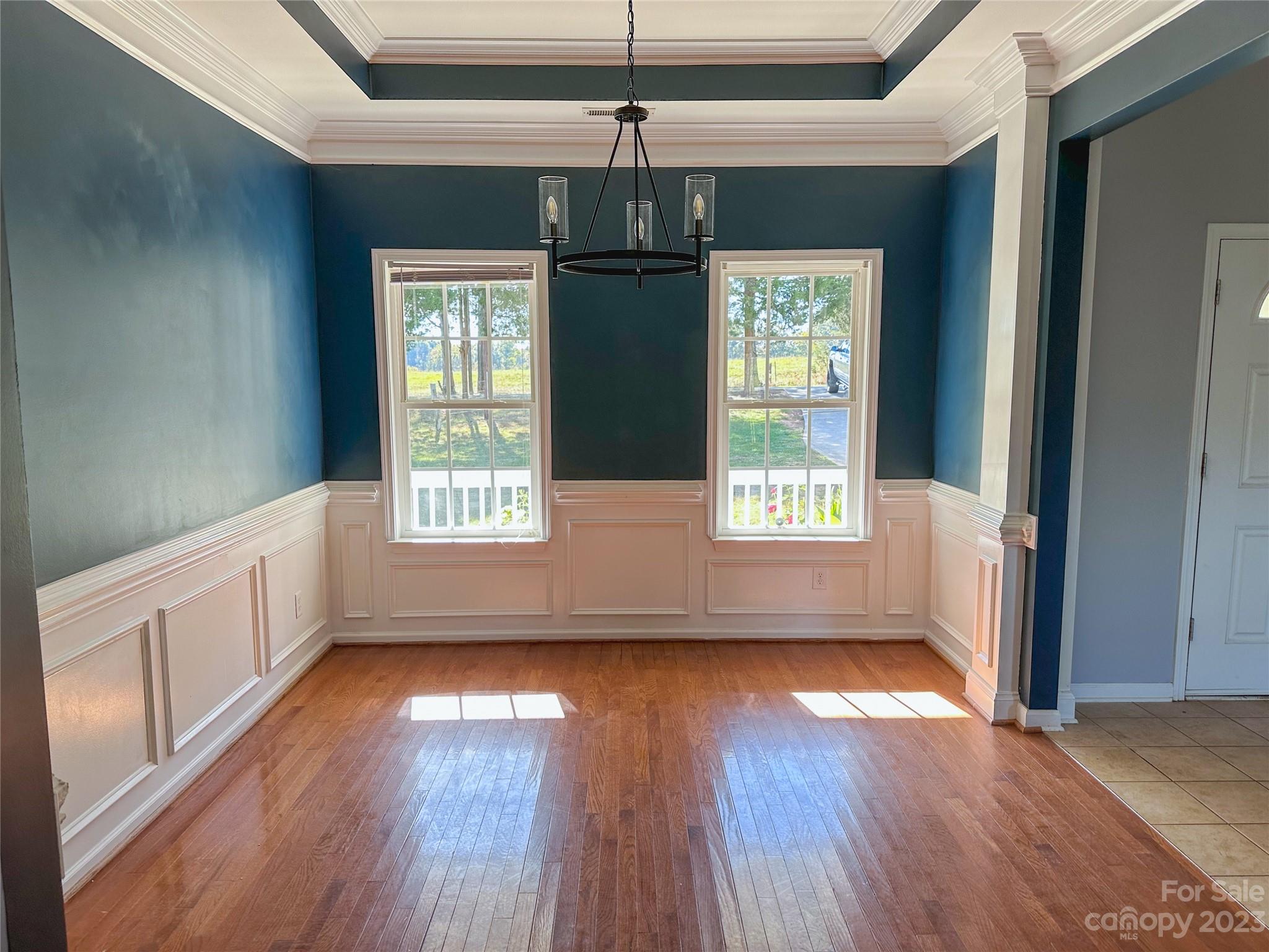 181 Weathers Creek Road Troutman, NC 28166 - Photo 9 of 25 a view of an entryway with wooden floor