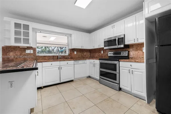 $820,000 | 8724 Northwest 189th Terrace, Hialeah, FL 33018