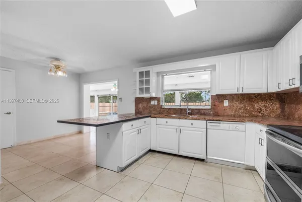 $820,000 | 8724 Northwest 189th Terrace, Hialeah, FL 33018