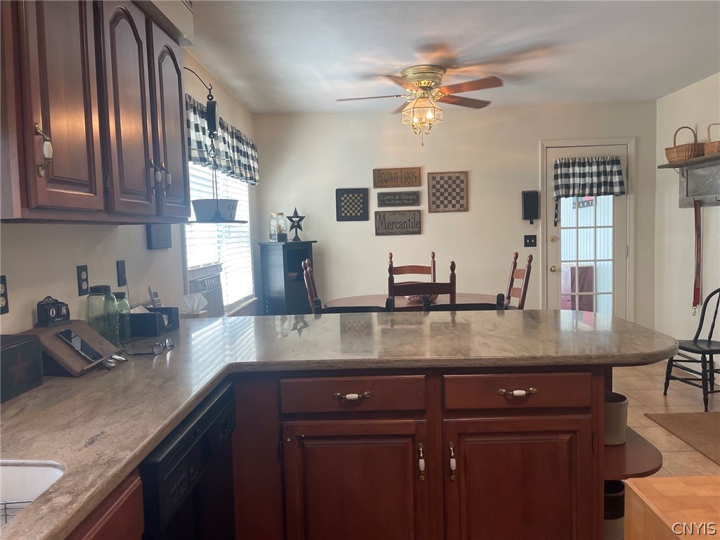 291 Betsinger Road Sherrill, NY 13461 - Photo 14 of 38 Kitchen with cherry cabinets & granite counters