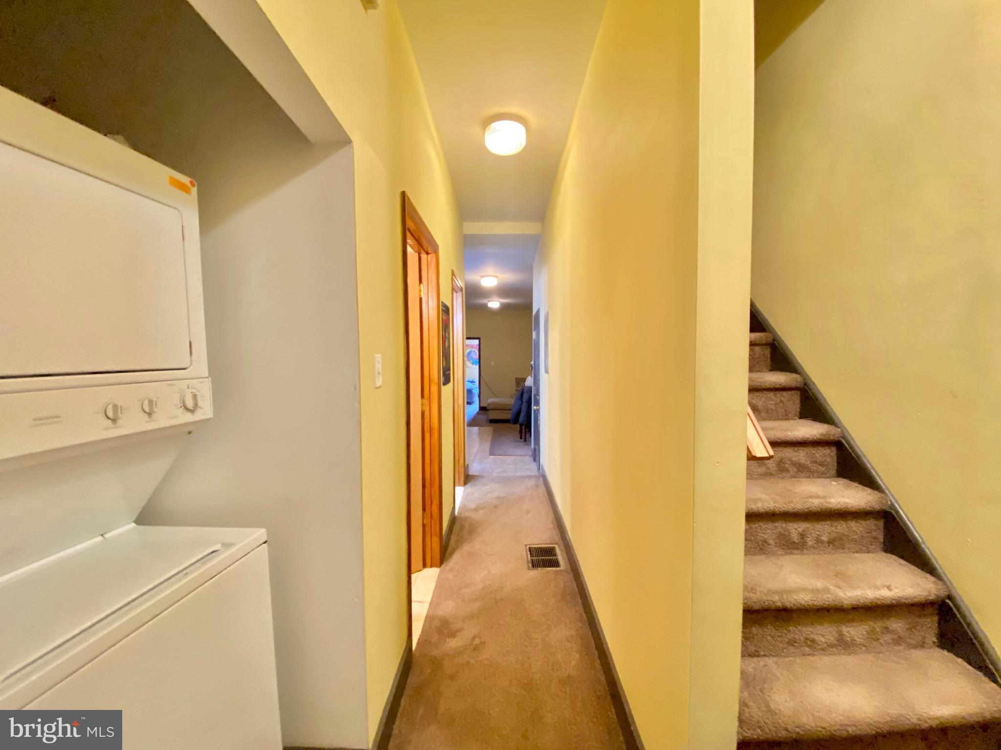 1435 West Norris Street, Unit B Philadelphia, PA 19121 - Photo 15 of 24 a view of a hallway with wooden floor and staircase