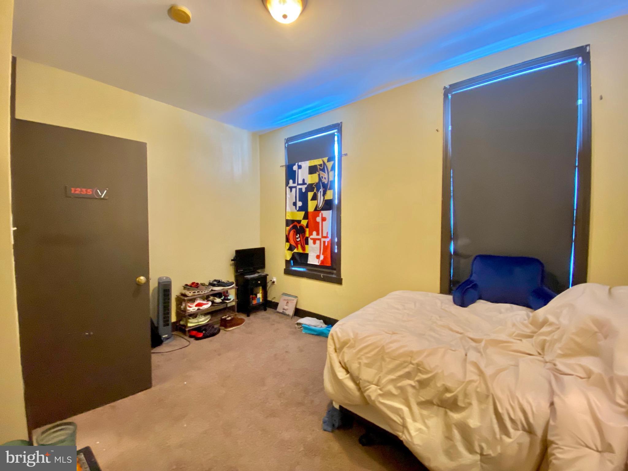 1435 West Norris Street, Unit B Philadelphia, PA 19121 - Photo 19 of 24 a bedroom with a bed and dresser