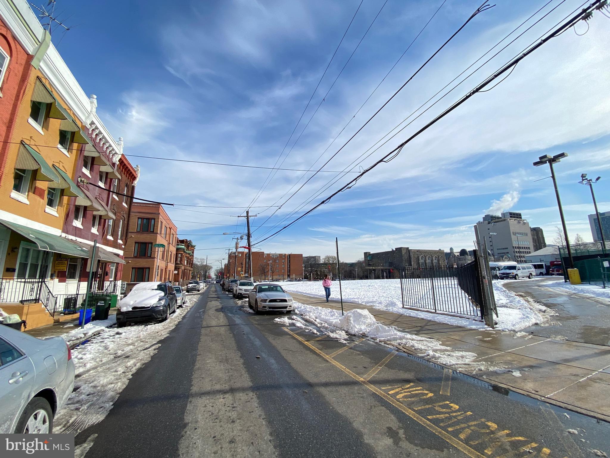 1435 West Norris Street, Unit B Philadelphia, PA 19121 - Photo 2 of 24 a car parked on the side of a street