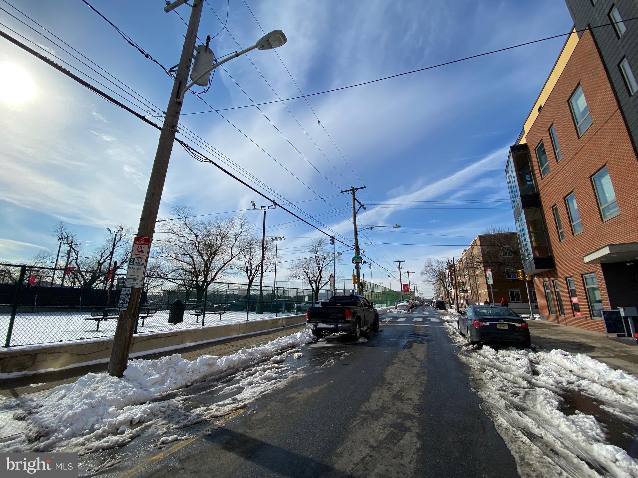 1435 West Norris Street, Unit B Philadelphia, PA 19121 - Photo 3 of 24 a view of a street with cars