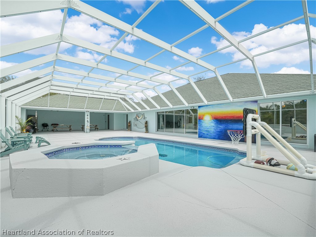 5721 Golden Road Sebring, FL 33875 - Photo 29 of 42 15x30 Heated, Caged Pool + 6x6 Spa