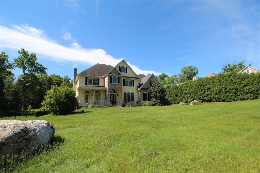 5 Gableview Lane Southwick, MA 01077 - Photo 6 of 41 a front view of a house with a yard