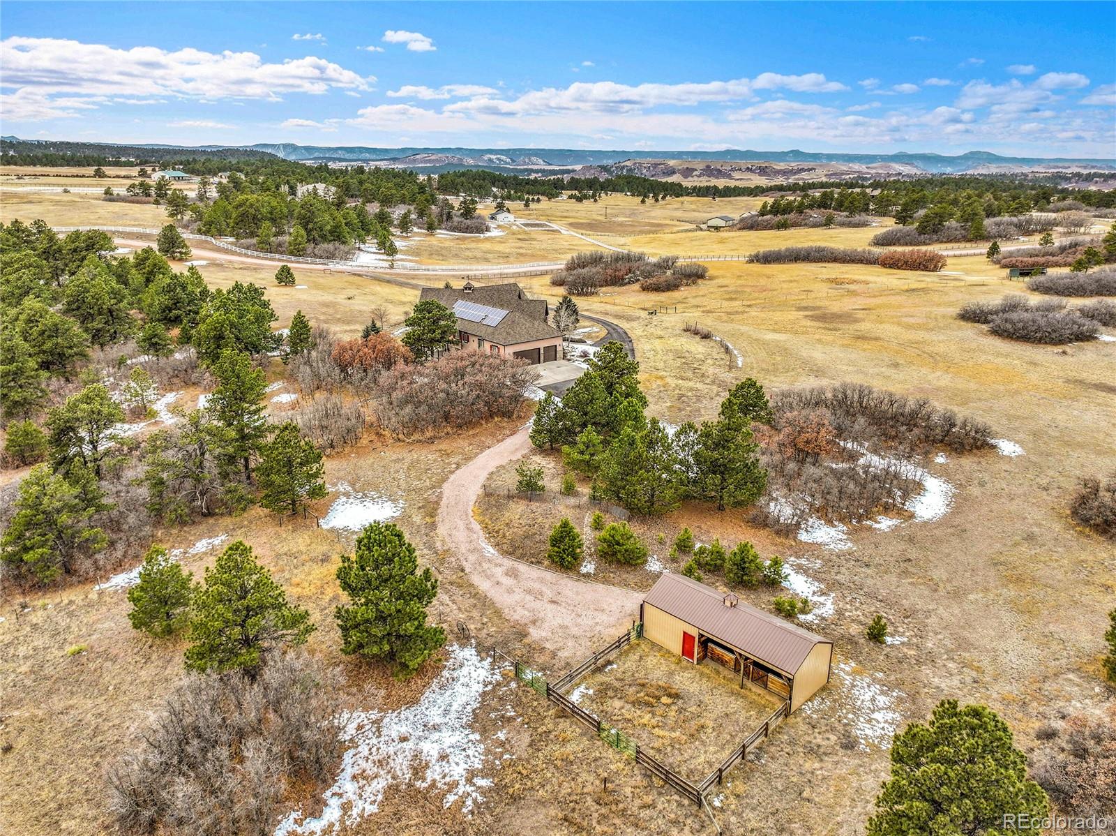 12984 Crowfoot Springs Road Franktown, CO 80116 - Photo 47 of 50 a view of an ocean and beach