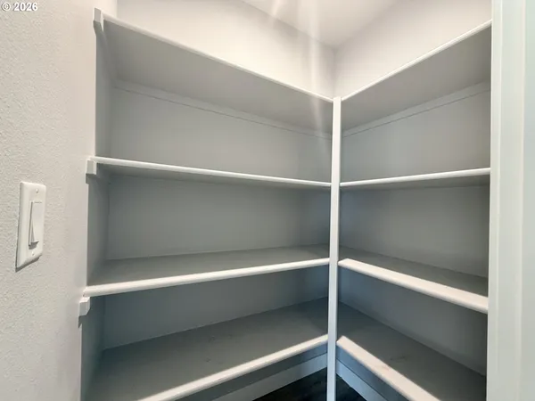 a view of an empty walk in closet