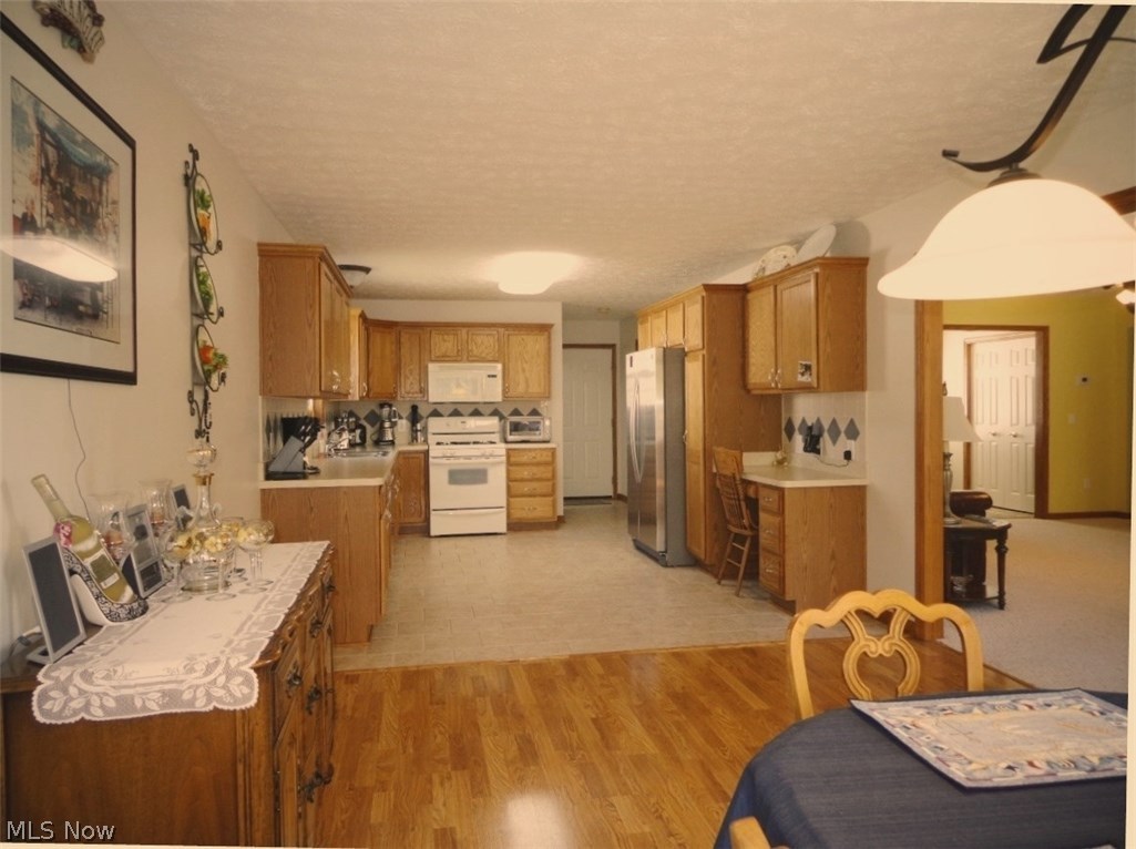 4158 Berkley Road Vermilion, OH 44089 - Photo 10 of 29 The spacious kitchen