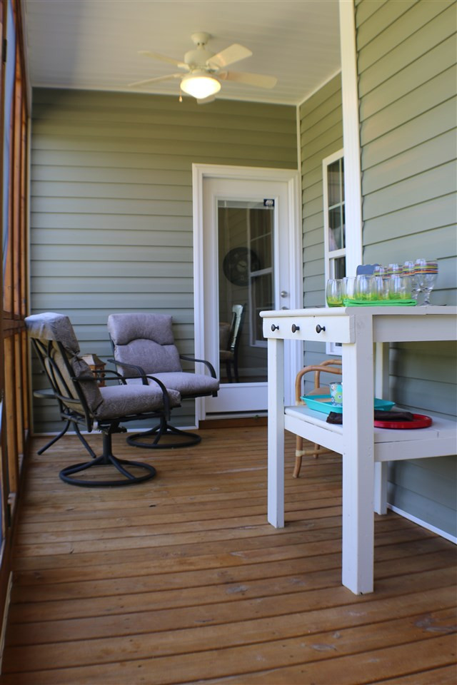 820 Hood Farm Road Clayton, NC 27520 - Photo 9 of 20 Enjoy sipping sweet tea & looking at your private oasis on this screened porch. Screened Porch