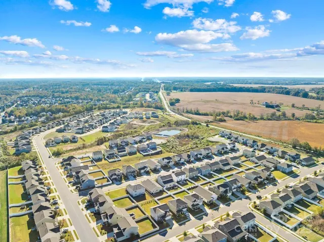a view of city with ocean