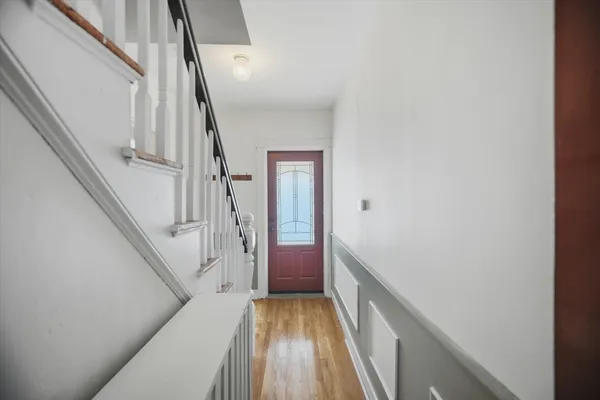 a view of entryway with a front door
