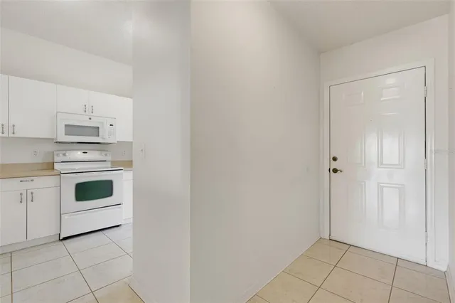 a kitchen with a sink and a window