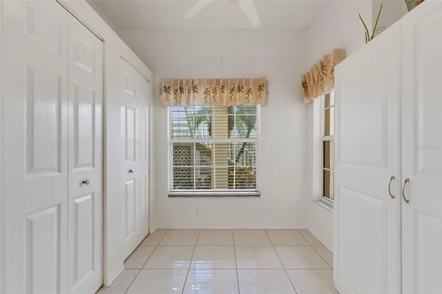 a kitchen with stainless steel appliances a refrigerator and microwave