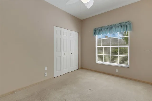 a view of a hallway view with wooden floor