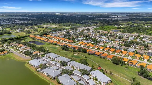 a view of a water fountain and a building in the background