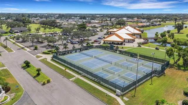 a view of an outdoor space and basketball court