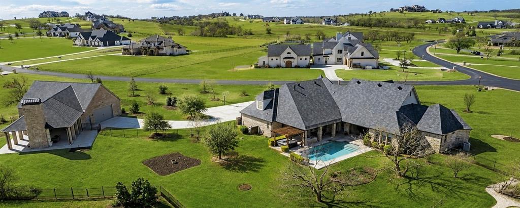 301 Rustic View Lane Aledo, TX 76008 - Photo 2 of 40 an aerial view of a house with garden space and outdoor seating