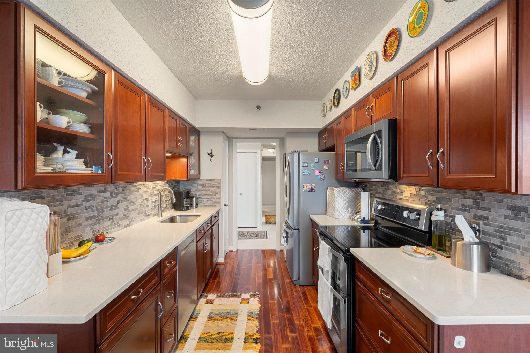 5505 Seminary Road, Unit 2205N Falls Church, VA 22041 - Photo 2 of 33 a kitchen with stainless steel appliances granite countertop a sink stove and refrigerator