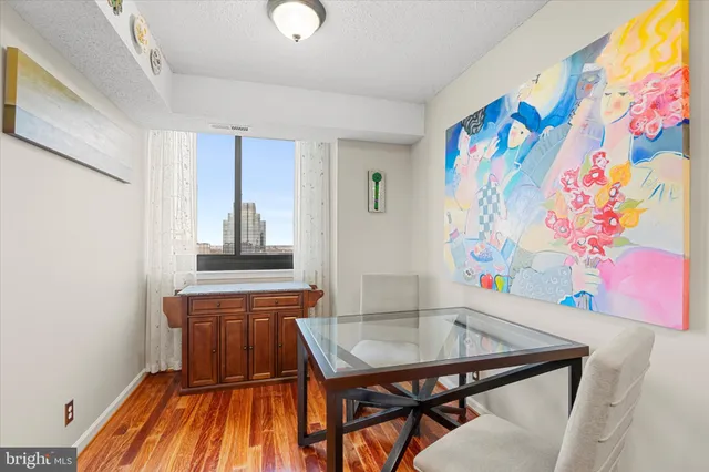 a room with furniture and wooden floor