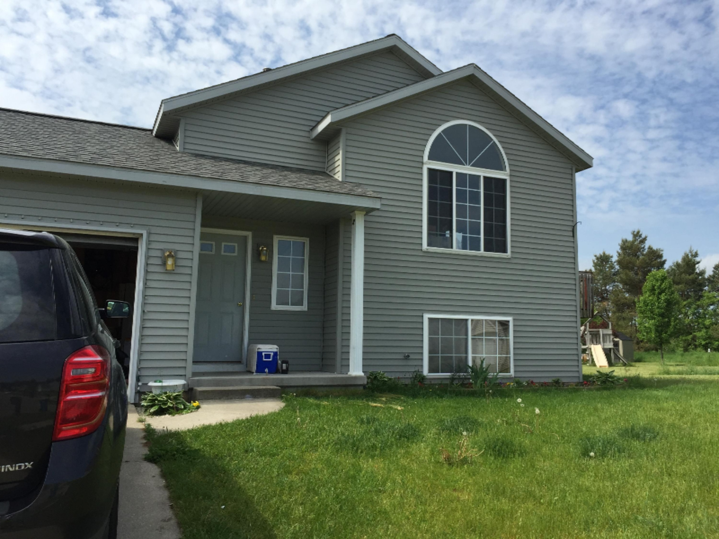 455 Pine Ridge Drive Belding, MI 48809 - Photo 1 of 24 Front