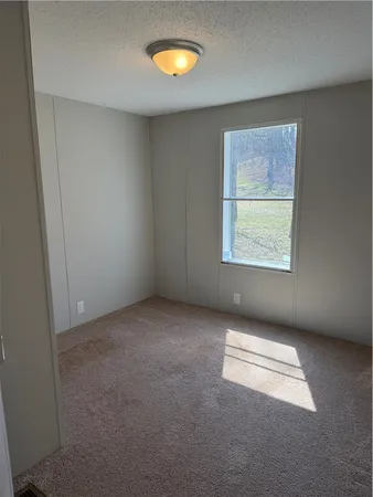 $124,900 | 402 Round Pond Road, Unit TN10, Smithville, NY 13841
